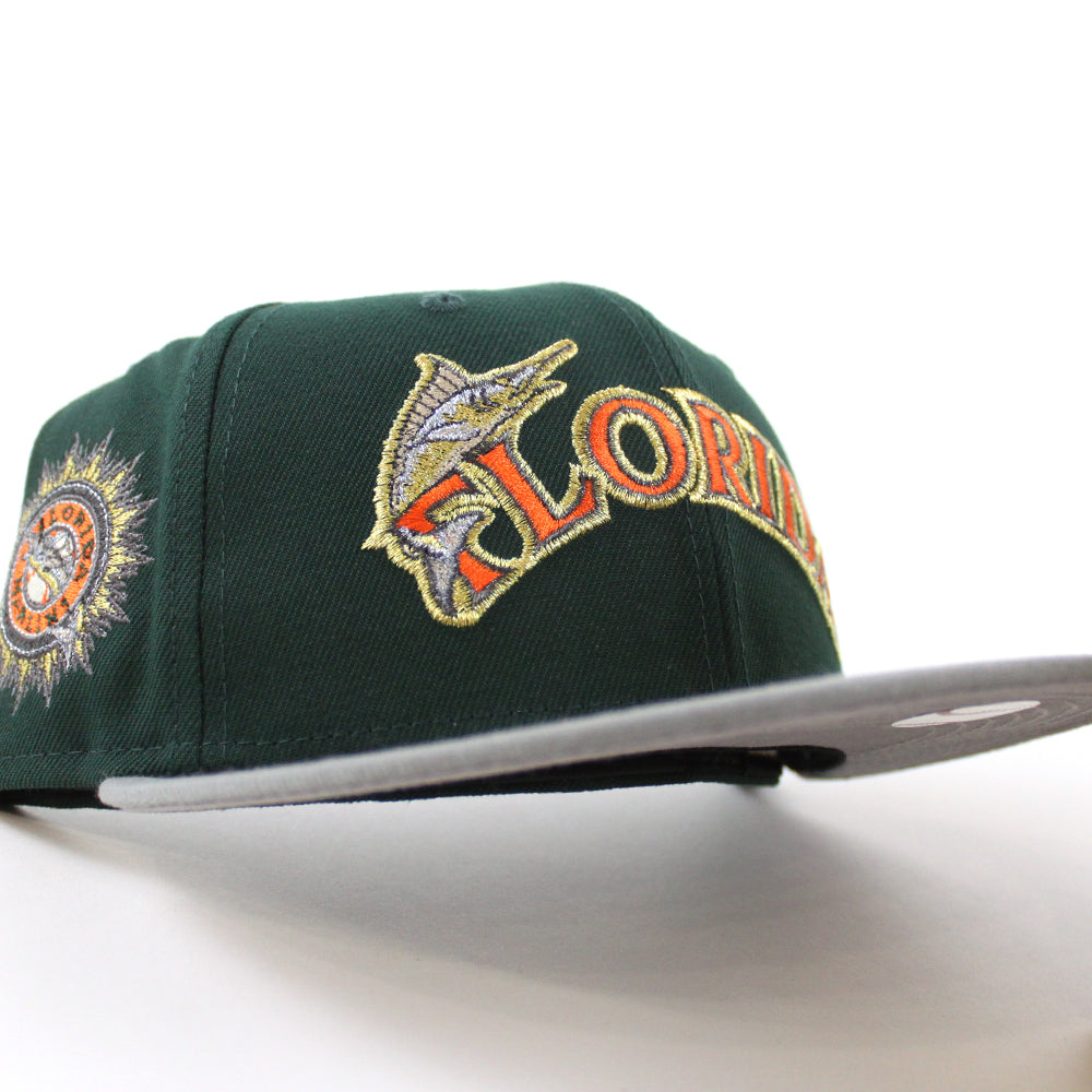 Shop New Era 59Fifty Miami Marlins Poinsettia Hat 70731055 green