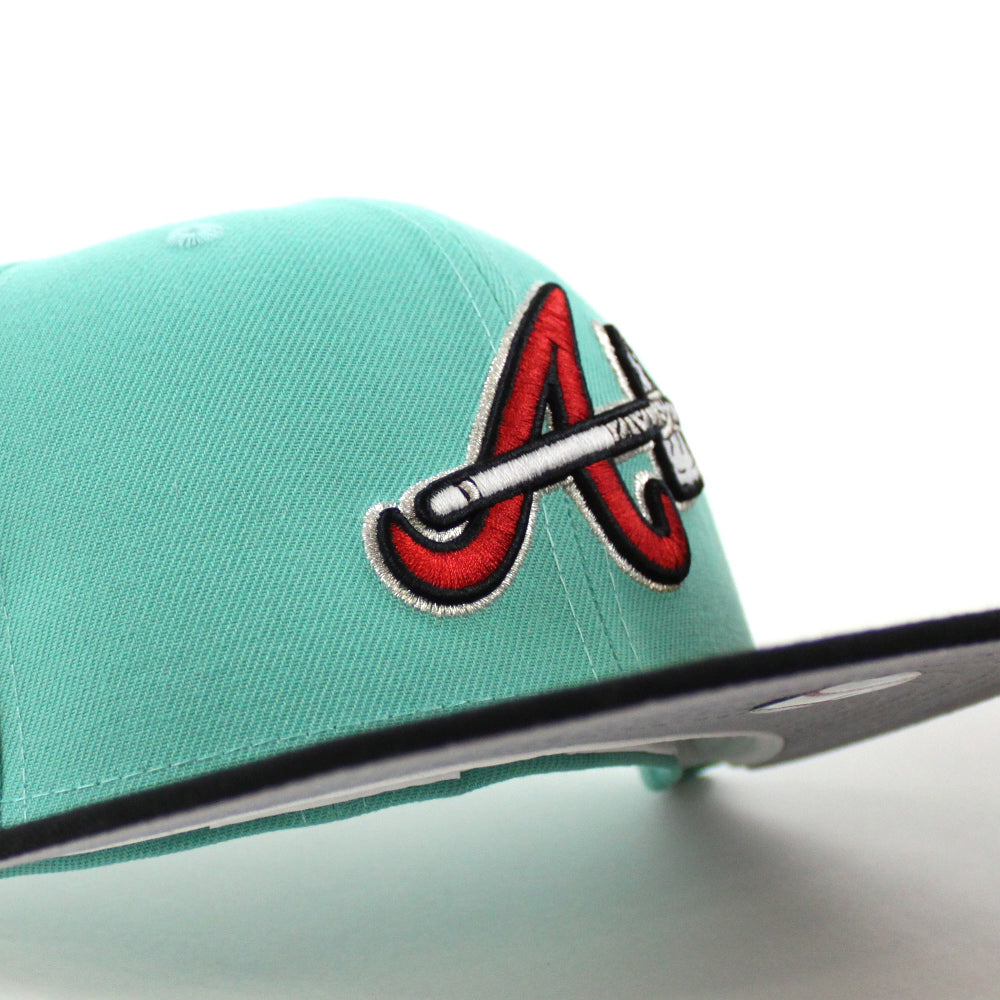 https://www.ecapcity.com/cdn/shop/products/Atlanta-Braves-2017-Inaugural-Season-New-Era-59Fifty-Fitted-Hat-_GITD-Mint-Black-Gray-Under-Brim_-6.jpg?v=1657194239