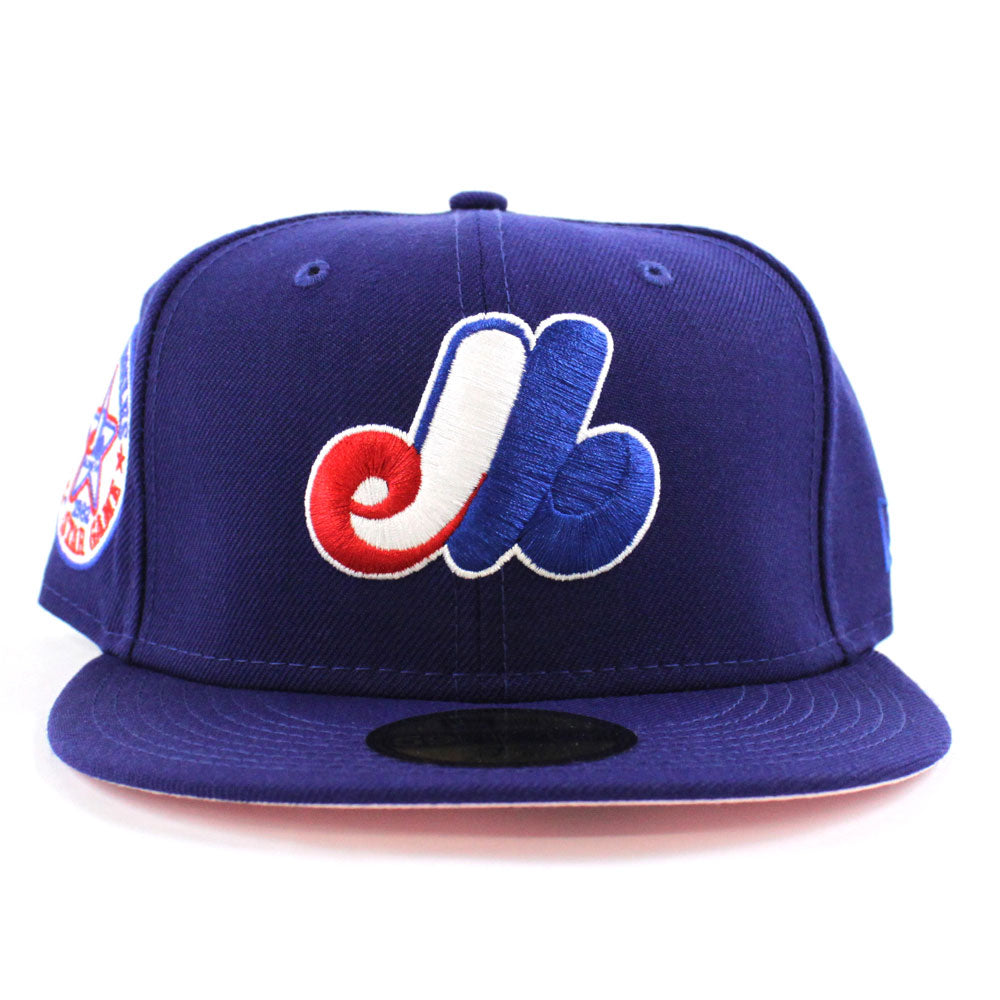 A Rive Droite New Era Cassandre baseball cap in the window of the