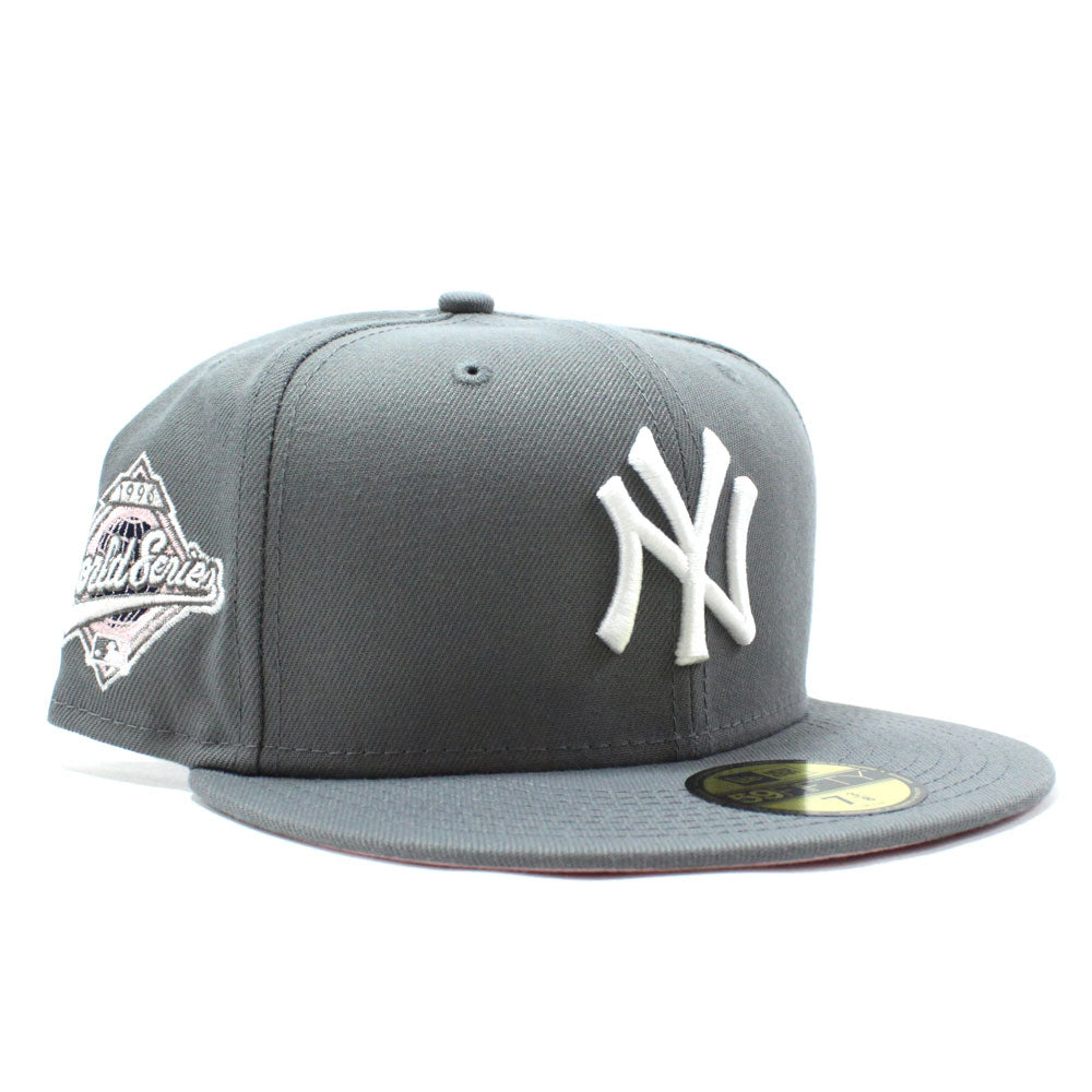 https://www.ecapcity.com/cdn/shop/products/New-York-Yankees-1996-World-Series-New-Era-59Fifty-Fitted-Hat-_Gray-Pink-Under-Brim_-2.jpg?v=1641824931