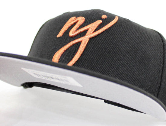Script 9fifty Snapback NJ Script New Era 9Fifty Snapback hat (Air Foamposite Metallic Copper ...